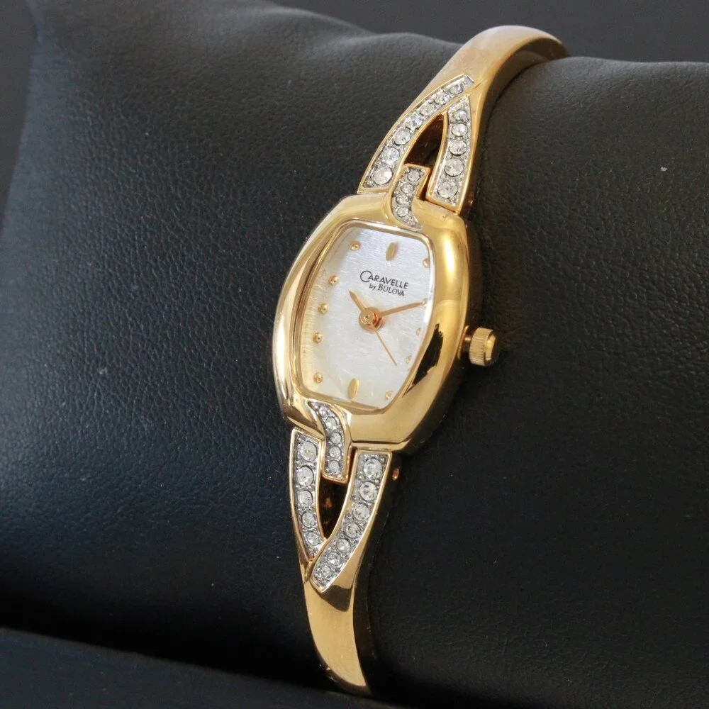 Caravelle Ladies Gold Tone Quartz Watch, MOP Dial, ½ Bangle Bracelet 16mm